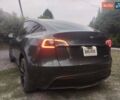 Серый Тесла Model Y, объемом двигателя 0 л и пробегом 25 тыс. км за 28000 $, фото 4 на Automoto.ua