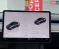 Серый Тесла Model Y, объемом двигателя 0 л и пробегом 18 тыс. км за 27300 $, фото 18 на Automoto.ua