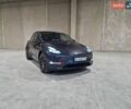 Серый Тесла Model Y, объемом двигателя 0 л и пробегом 15 тыс. км за 31500 $, фото 1 на Automoto.ua