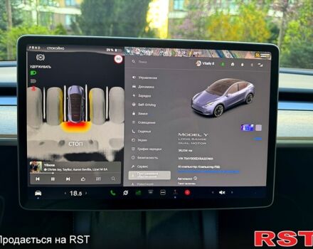 Серый Тесла Model Y, объемом двигателя 0.45 л и пробегом 34 тыс. км за 29900 $, фото 13 на Automoto.ua