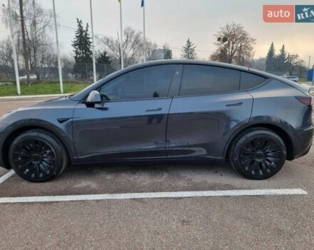Серый Тесла Model Y, объемом двигателя 0 л и пробегом 24 тыс. км за 30900 $, фото 3 на Automoto.ua