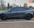 Серый Тесла Model Y, объемом двигателя 0 л и пробегом 24 тыс. км за 30900 $, фото 3 на Automoto.ua