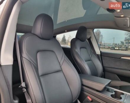 Серый Тесла Model Y, объемом двигателя 0 л и пробегом 24 тыс. км за 30900 $, фото 25 на Automoto.ua