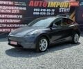 Серый Тесла Model Y, объемом двигателя 0 л и пробегом 43 тыс. км за 27000 $, фото 1 на Automoto.ua