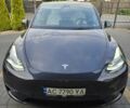 Сірий Тесла Model Y, об'ємом двигуна 0 л та пробігом 128 тис. км за 35700 $, фото 1 на Automoto.ua