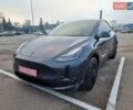 Серый Тесла Model Y, объемом двигателя 0 л и пробегом 24 тыс. км за 30900 $, фото 1 на Automoto.ua