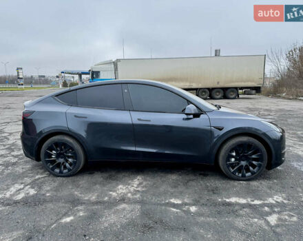 Серый Тесла Model Y, объемом двигателя 0 л и пробегом 22 тыс. км за 27000 $, фото 3 на Automoto.ua