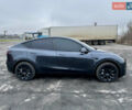 Серый Тесла Model Y, объемом двигателя 0 л и пробегом 22 тыс. км за 27000 $, фото 3 на Automoto.ua