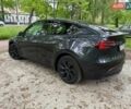 Серый Тесла Model Y, объемом двигателя 0 л и пробегом 9 тыс. км за 29990 $, фото 3 на Automoto.ua