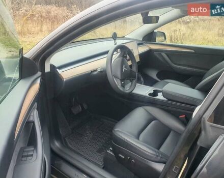 Серый Тесла Model Y, объемом двигателя 0 л и пробегом 25 тыс. км за 28000 $, фото 8 на Automoto.ua