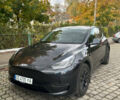 Серый Тесла Model Y, объемом двигателя 0 л и пробегом 26 тыс. км за 31700 $, фото 1 на Automoto.ua