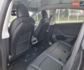 Серый Тесла Model Y, объемом двигателя 0 л и пробегом 24 тыс. км за 30900 $, фото 14 на Automoto.ua