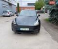 Серый Тесла Model Y, объемом двигателя 0 л и пробегом 24 тыс. км за 24800 $, фото 1 на Automoto.ua