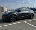 Серый Тесла Model Y, объемом двигателя 0 л и пробегом 20 тыс. км за 28000 $, фото 1 на Automoto.ua