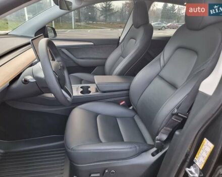 Серый Тесла Model Y, объемом двигателя 0 л и пробегом 24 тыс. км за 30900 $, фото 10 на Automoto.ua