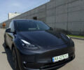 Серый Тесла Model Y, объемом двигателя 0 л и пробегом 9 тыс. км за 29900 $, фото 1 на Automoto.ua
