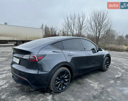 Серый Тесла Model Y, объемом двигателя 0 л и пробегом 22 тыс. км за 27000 $, фото 4 на Automoto.ua