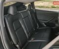 Серый Тесла Model Y, объемом двигателя 0 л и пробегом 25 тыс. км за 31300 $, фото 54 на Automoto.ua