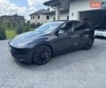 Серый Тесла Model Y, объемом двигателя 0 л и пробегом 20 тыс. км за 33900 $, фото 1 на Automoto.ua
