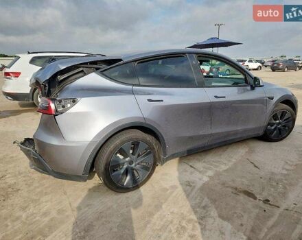 Серый Тесла Model Y, объемом двигателя 0 л и пробегом 26 тыс. км за 21800 $, фото 3 на Automoto.ua