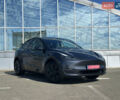 Серый Тесла Model Y, объемом двигателя 0 л и пробегом 1 тыс. км за 38990 $, фото 1 на Automoto.ua