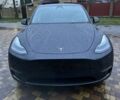Серый Тесла Model Y, объемом двигателя 0 л и пробегом 14 тыс. км за 28200 $, фото 1 на Automoto.ua