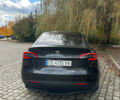 Серый Тесла Model Y, объемом двигателя 0 л и пробегом 26 тыс. км за 31700 $, фото 2 на Automoto.ua