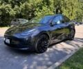 Серый Тесла Model Y, объемом двигателя 0 л и пробегом 56 тыс. км за 31900 $, фото 1 на Automoto.ua