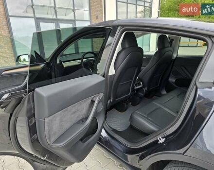 Серый Тесла Model Y, объемом двигателя 0 л и пробегом 7 тыс. км за 28400 $, фото 19 на Automoto.ua
