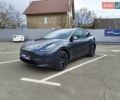 Серый Тесла Model Y, объемом двигателя 0 л и пробегом 1 тыс. км за 33000 $, фото 1 на Automoto.ua