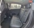 Серый Тесла Model Y, объемом двигателя 0 л и пробегом 24 тыс. км за 30900 $, фото 13 на Automoto.ua