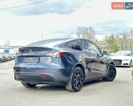 Серый Тесла Model Y, объемом двигателя 0 л и пробегом 1 тыс. км за 39900 $, фото 1 на Automoto.ua