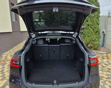 Серый Тесла Model Y, объемом двигателя 0 л и пробегом 18 тыс. км за 30500 $, фото 1 на Automoto.ua