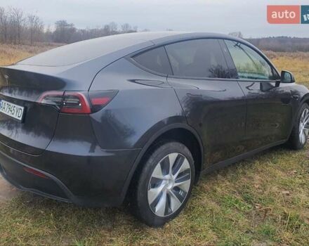 Серый Тесла Model Y, объемом двигателя 0 л и пробегом 25 тыс. км за 28000 $, фото 2 на Automoto.ua