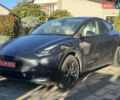 Серый Тесла Model Y, объемом двигателя 0 л и пробегом 8 тыс. км за 28700 $, фото 1 на Automoto.ua