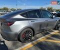 Серый Тесла Model Y, объемом двигателя 0 л и пробегом 15 тыс. км за 28500 $, фото 1 на Automoto.ua