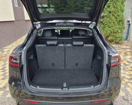 Серый Тесла Model Y, объемом двигателя 0 л и пробегом 18 тыс. км за 30500 $, фото 4 на Automoto.ua