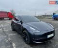 Серый Тесла Model Y, объемом двигателя 0 л и пробегом 22 тыс. км за 27000 $, фото 2 на Automoto.ua