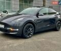 Серый Тесла Model Y, объемом двигателя 0 л и пробегом 23 тыс. км за 28800 $, фото 1 на Automoto.ua