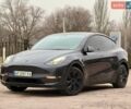 Серый Тесла Model Y, объемом двигателя 0 л и пробегом 23 тыс. км за 32000 $, фото 1 на Automoto.ua