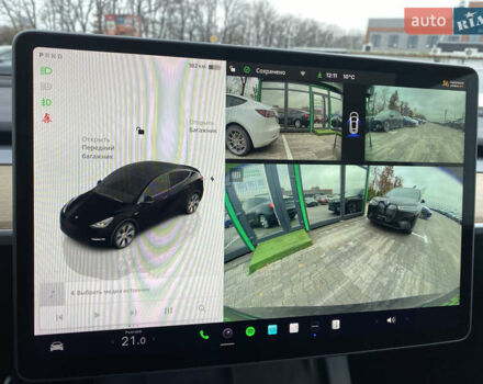 Серый Тесла Model Y, объемом двигателя 0 л и пробегом 25 тыс. км за 33900 $, фото 18 на Automoto.ua