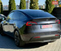 Серый Тесла Model Y, объемом двигателя 0 л и пробегом 12 тыс. км за 29500 $, фото 3 на Automoto.ua
