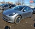 Серый Тесла Model Y, объемом двигателя 0 л и пробегом 18 тыс. км за 14000 $, фото 1 на Automoto.ua