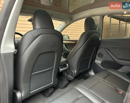 Серый Тесла Model Y, объемом двигателя 0 л и пробегом 2 тыс. км за 35490 $, фото 32 на Automoto.ua