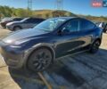 Серый Тесла Model Y, объемом двигателя 0 л и пробегом 14 тыс. км за 12999 $, фото 1 на Automoto.ua
