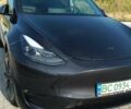 Серый Тесла Model Y, объемом двигателя 0 л и пробегом 20 тыс. км за 29600 $, фото 1 на Automoto.ua