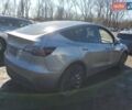 Серый Тесла Model Y, объемом двигателя 0 л и пробегом 18 тыс. км за 14000 $, фото 2 на Automoto.ua