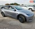 Серый Тесла Model Y, объемом двигателя 0 л и пробегом 26 тыс. км за 21800 $, фото 1 на Automoto.ua