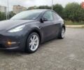 Серый Тесла Model Y, объемом двигателя 0 л и пробегом 30 тыс. км за 31500 $, фото 1 на Automoto.ua