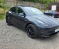 Серый Тесла Model Y, объемом двигателя 0 л и пробегом 25 тыс. км за 28500 $, фото 1 на Automoto.ua